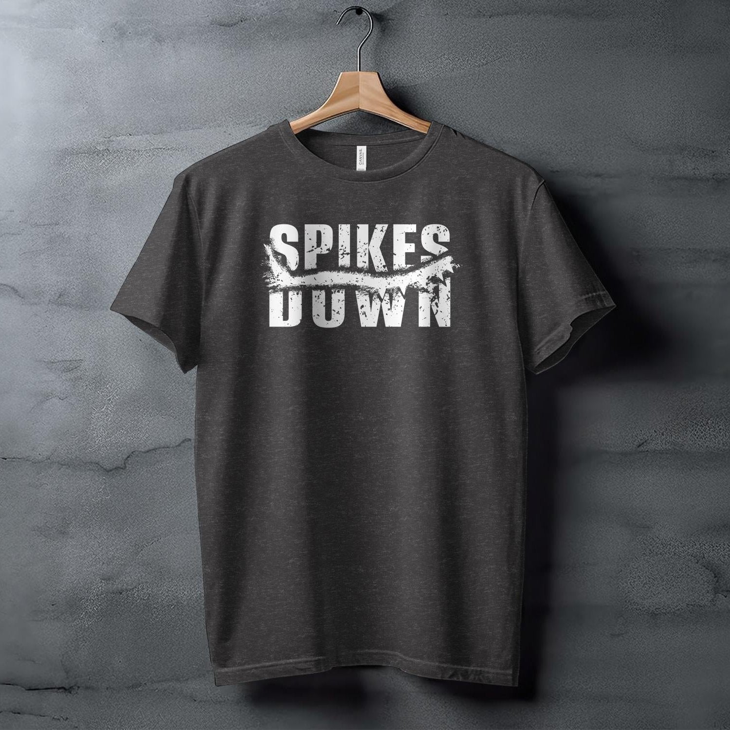 Black t-shirt with white "Spikes Down" graphic.